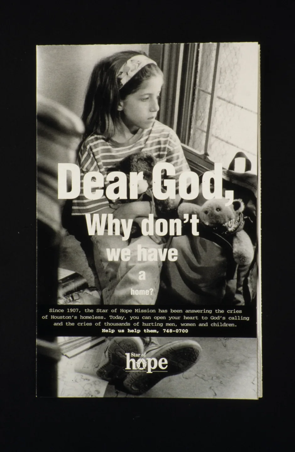 Original Star of Hope advertisement showing a girl holding a stuffed animal by a window.