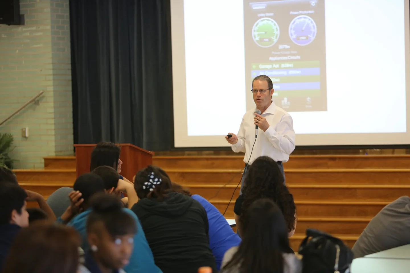 David Goswick speaking with students about home energy and technology.